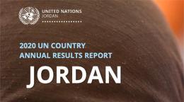 A close up image of a woman's eyes with her mouth and forehead covered by a black hijab.