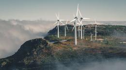 风力发电场发电减少了对燃煤能源的依赖。