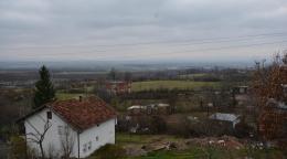 A panoramic view of houses by the foothills in Kosovo