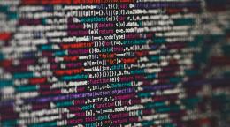 An image of colorful numbers spelling out a code.