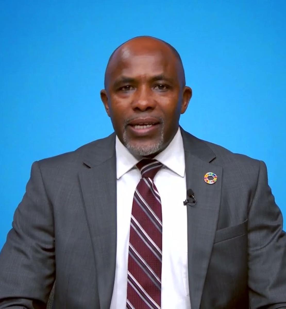 Screenshot from video message shows Resident Coordinator, George Wachira