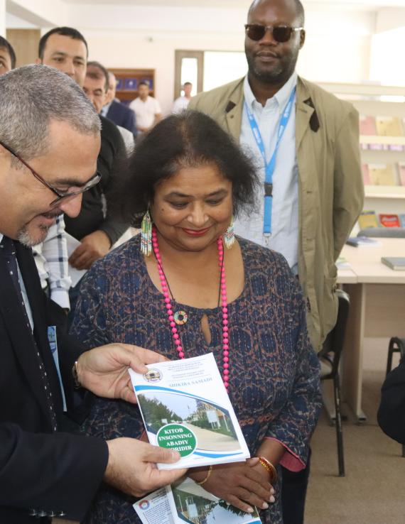 UN Resident and Humanitarian Coordinator for Afghanistan, Dr Ramiz Alakbarov, and the UN Resident Coordinator for Uzbekistan Ms. Roli Asthana speak with Shekiba Samadi, a student at the Educational Center for Training Afghan Citizens (ETAC) in Termez, Uzbekistan 