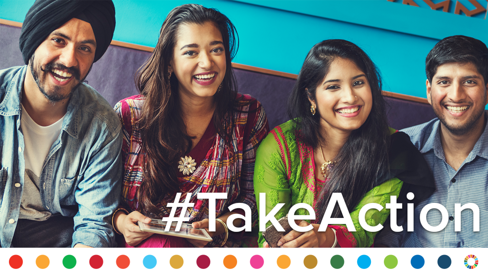 Two couples smiling and encouraging people to take action