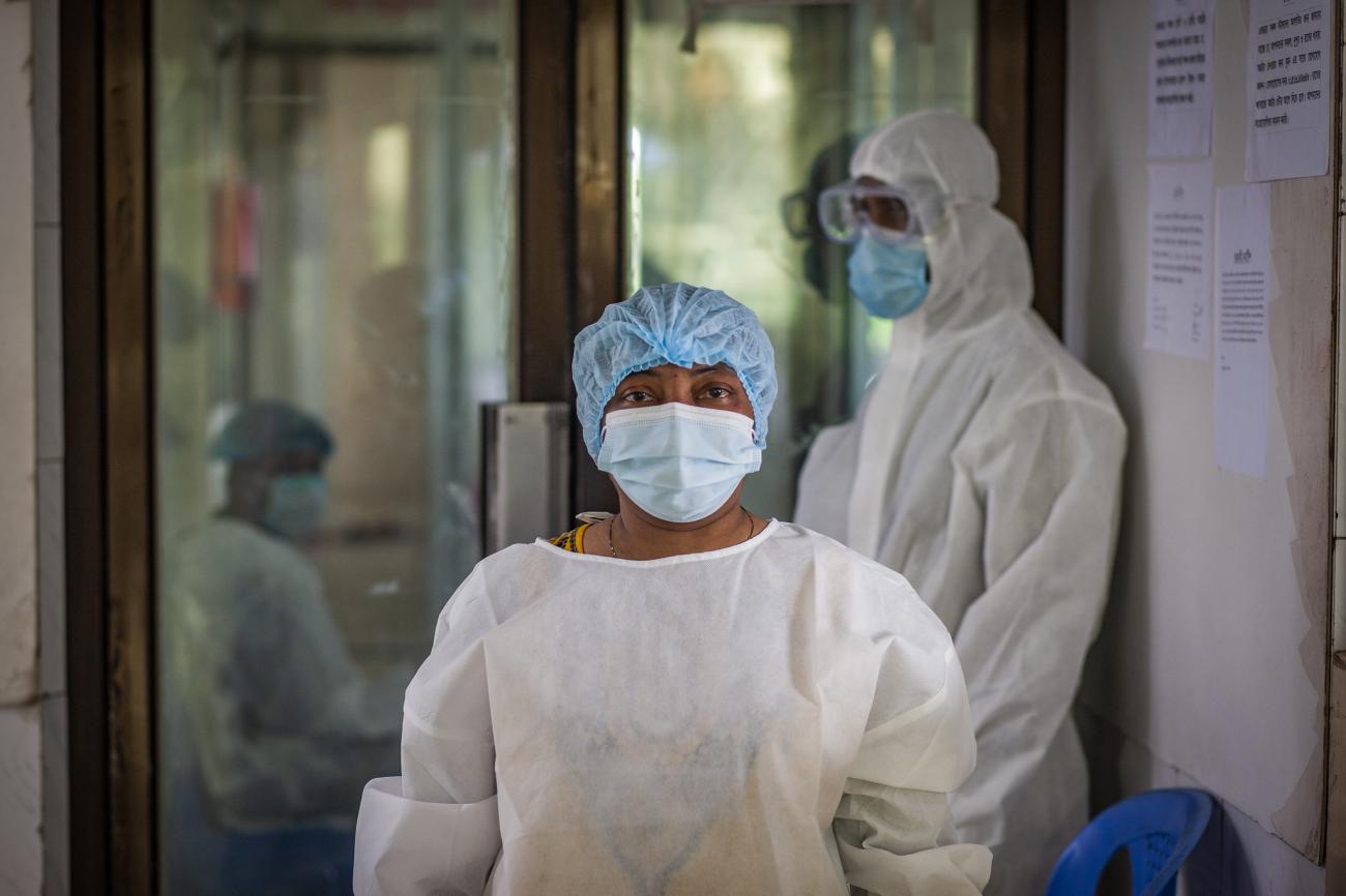 A cleaner waiting to begin her duty after getting disinfected at the Narayanganj-based Sajida Foundation hospital’s isolation unit for coronavirus-infected patients.