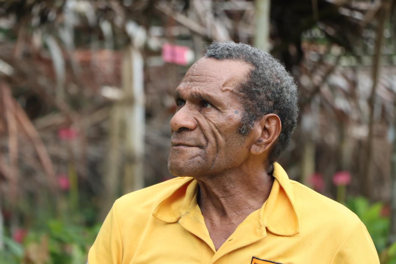 Michael Butuhe, retired primary-level teacher and head of the village business group.
