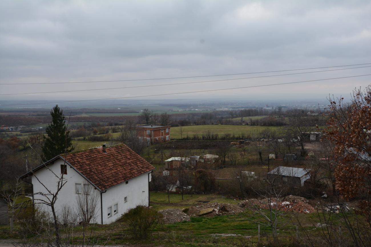 A panoramic view of houses by the foothills in Kosovo