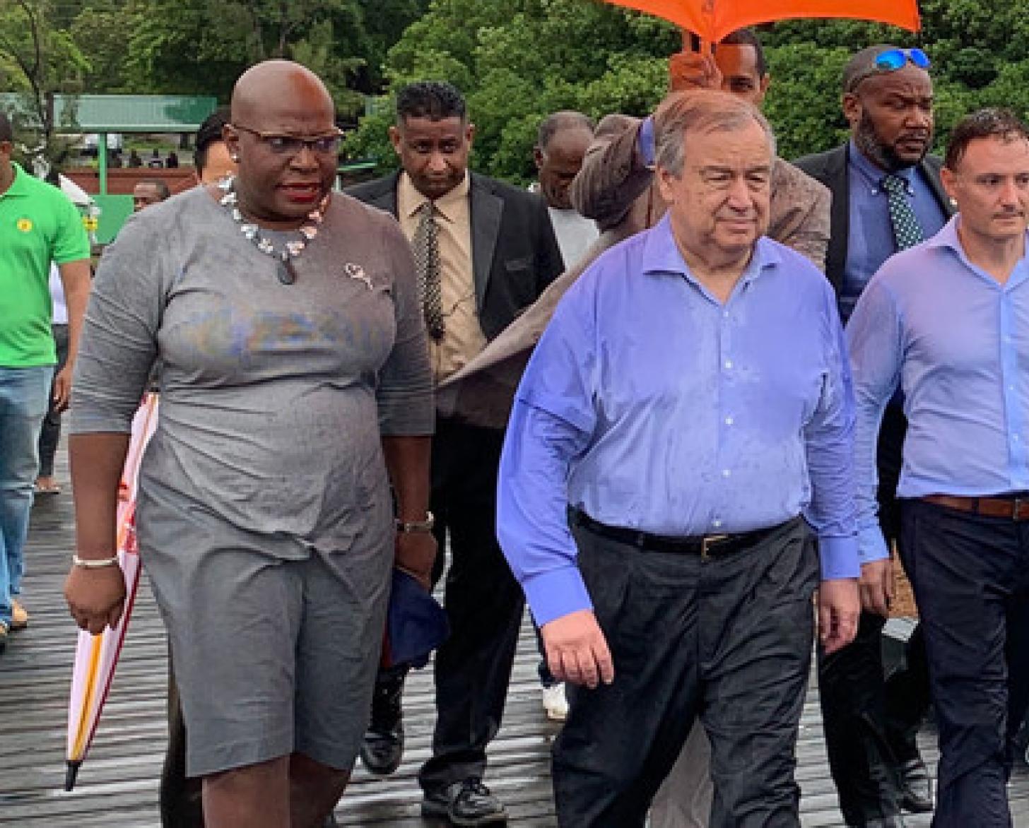 he UN Resident Coordinator for Barbados and the Organisation of Eastern Caribbean States (OECS), Didier Trebucq (right) accompanies UN Secretary General, António Guterres (centre) on a trip to St Lucia.