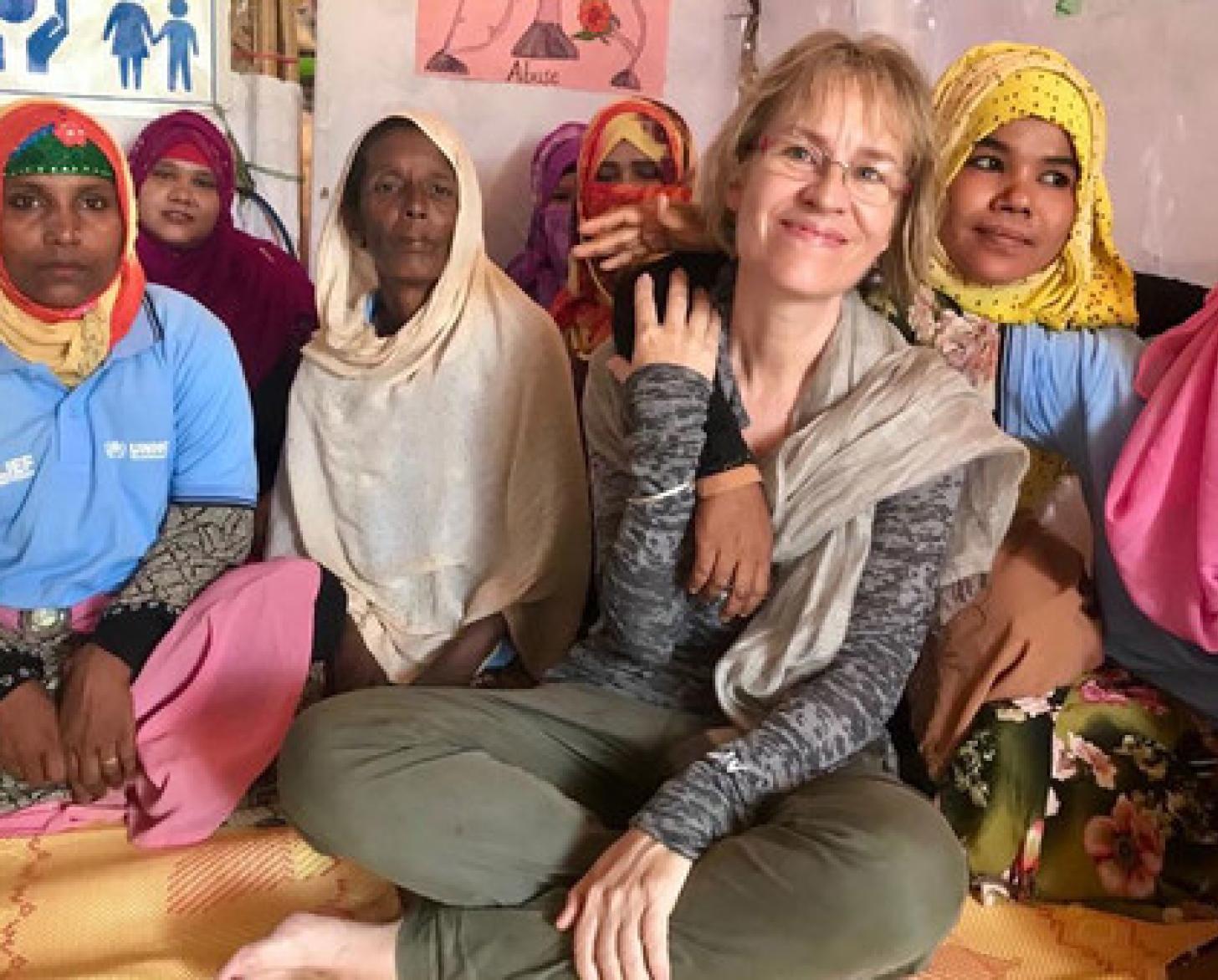 The UN Resident Coordinator in Bangladesh, Mia Seppo (centre), meets refugees in the west of the country in 2019.