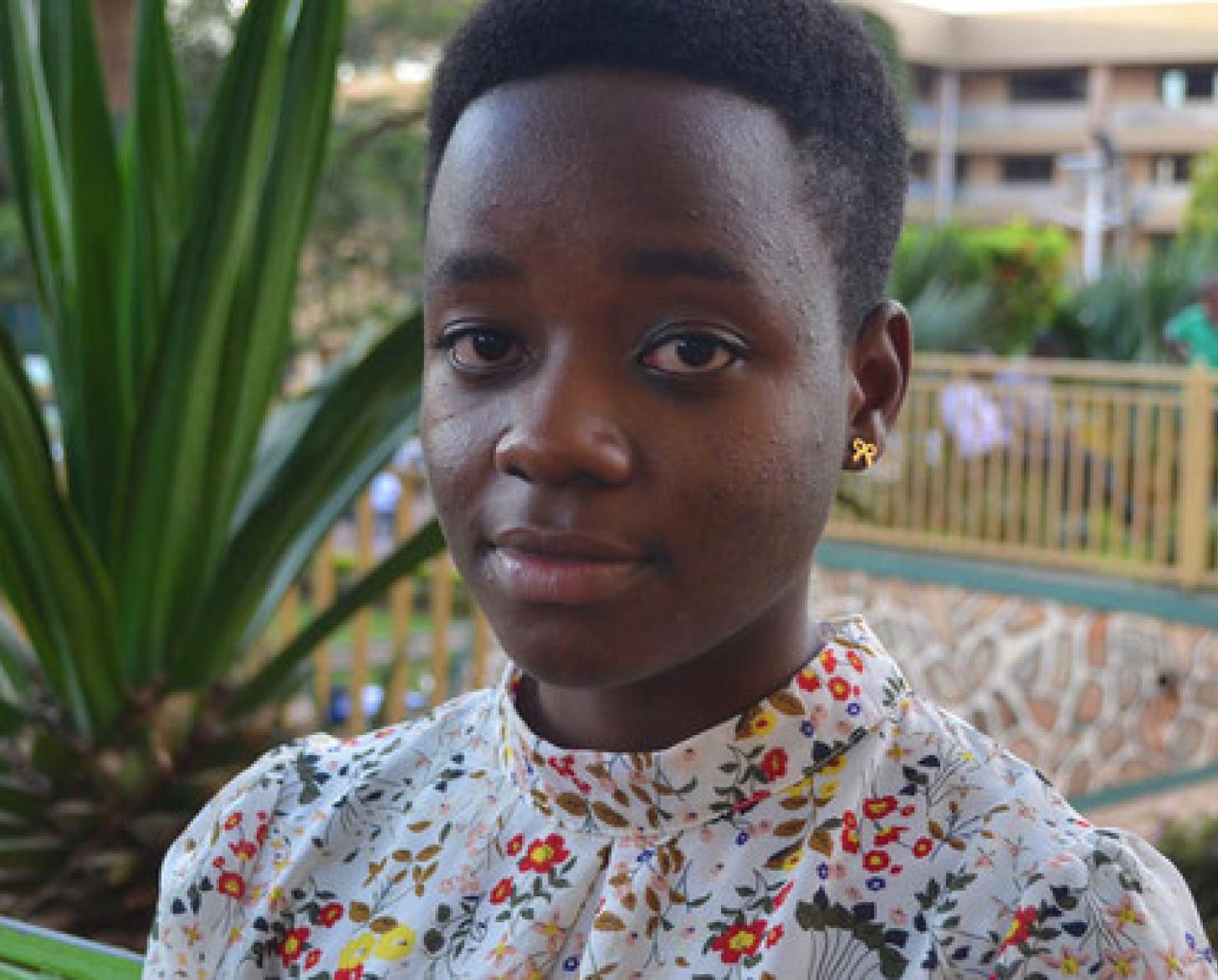 Photo shows a close-up of Leah Namugerwa, Ugandan youth climate activist.