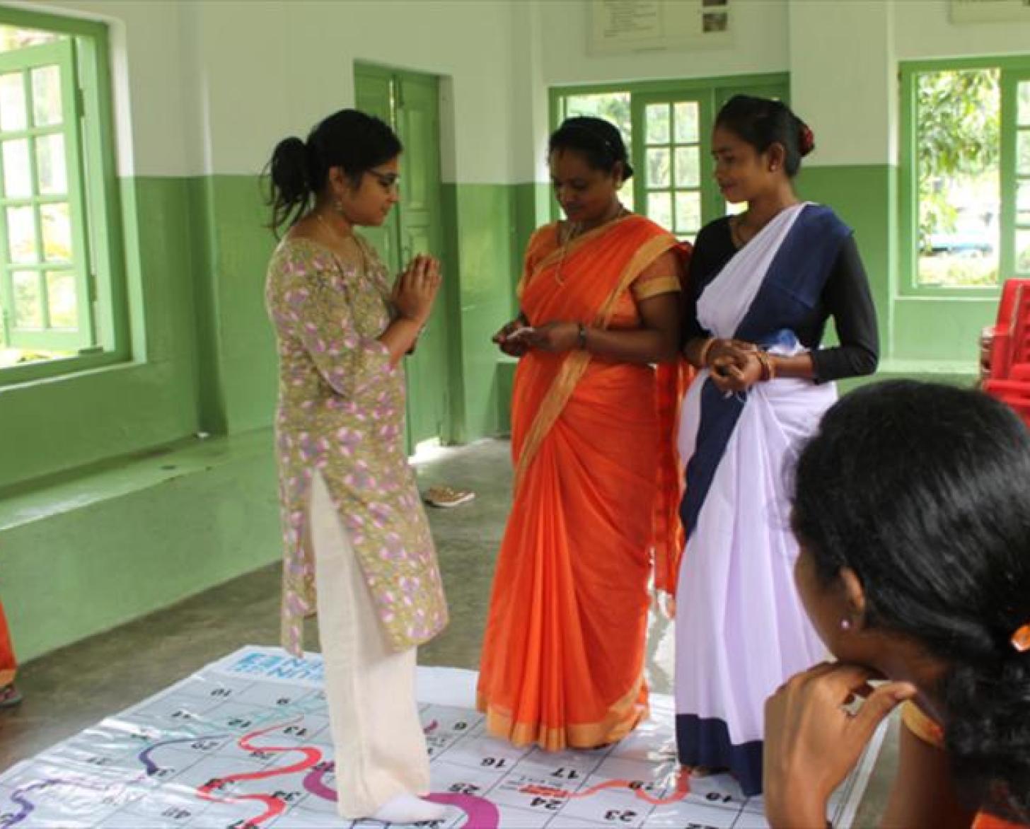 Members of a “Jugnu” club get trained by UN Women on supporting women who experience gender-based violence.
