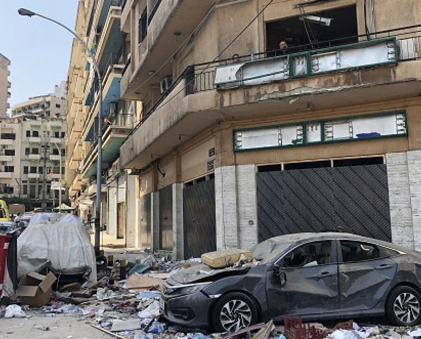 The photo depicts the immense physical damage the blast placed on the city. It shows destroyed cars, buildings and the streets of one of the neighbourhoods impacted.